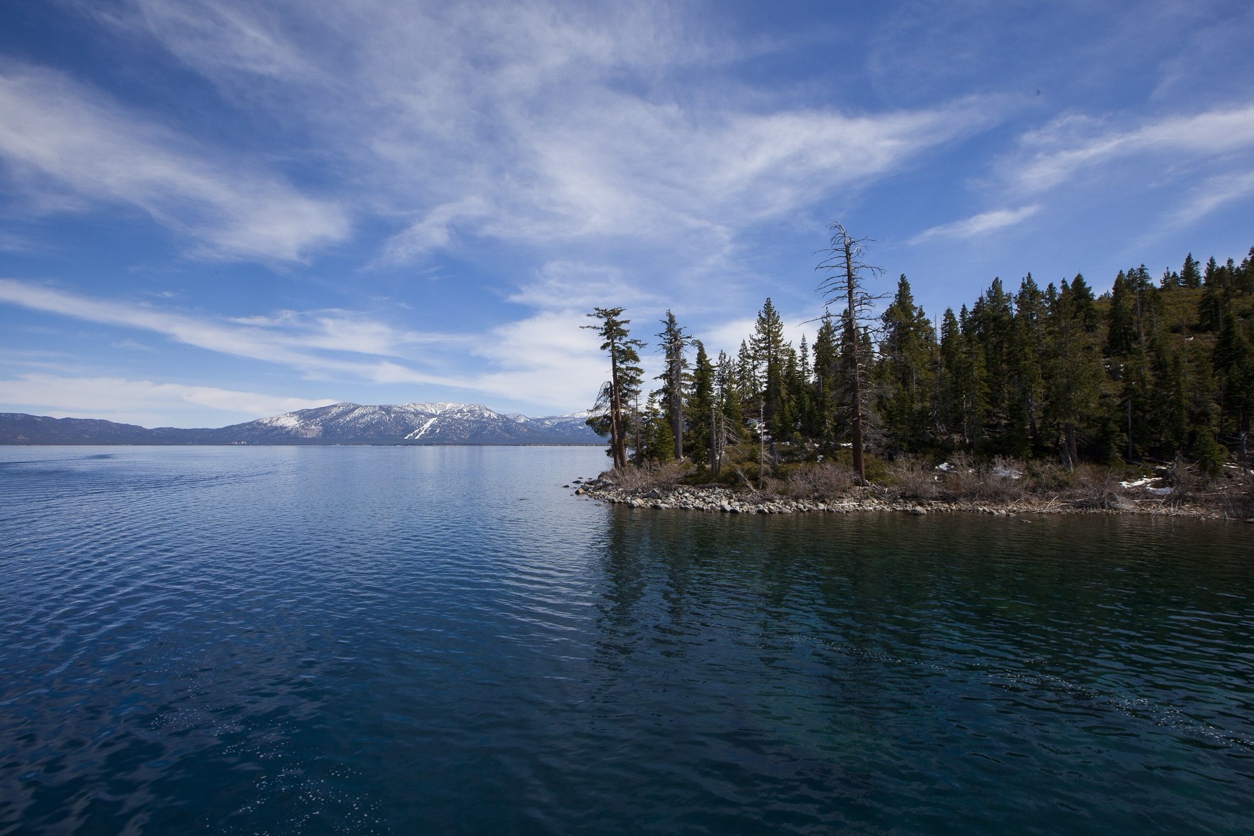 Lake Tahoe's north shore seen from the east, deep blue water against the Sierra