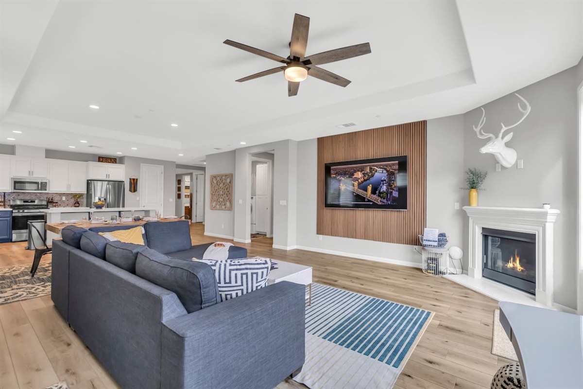 Sink into our comfy sectional after a long day out and relax in front of the 85" smart TV with Netflix provided