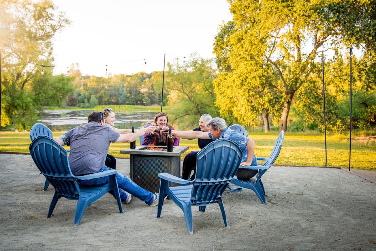 Wine country days are better when everyone has a place to come back to — gather around the fire, pour a glass, and let the evening slow down overlooking the lake.