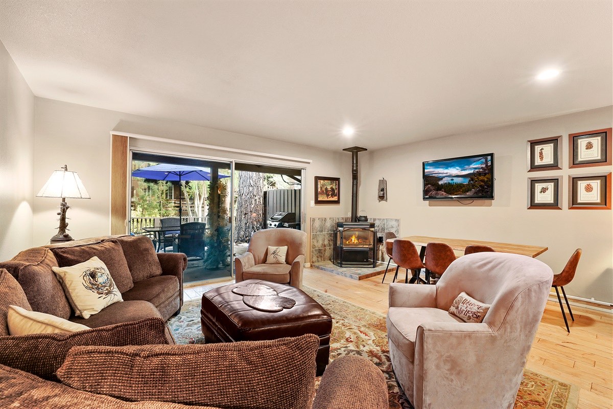 Whispering Waters living room with a wood stove